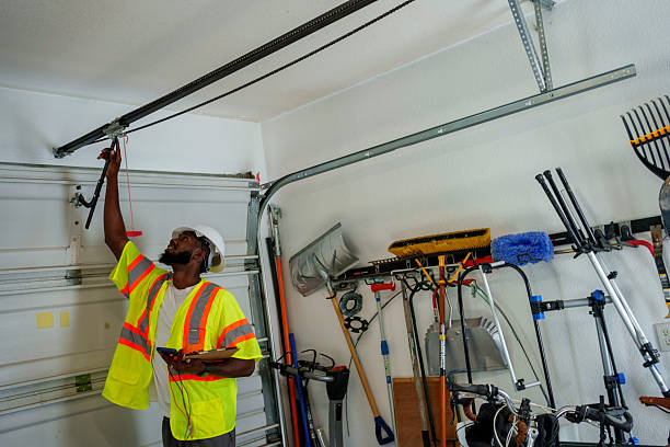 Professional Garage Door Panel Replacement technician working in Hilton, NY